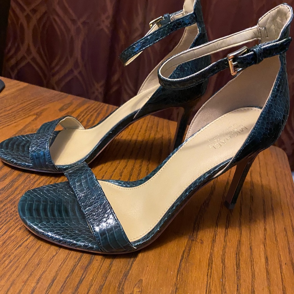Michael Kors emerald green snake skin heels.  Excellent condition. Never worn